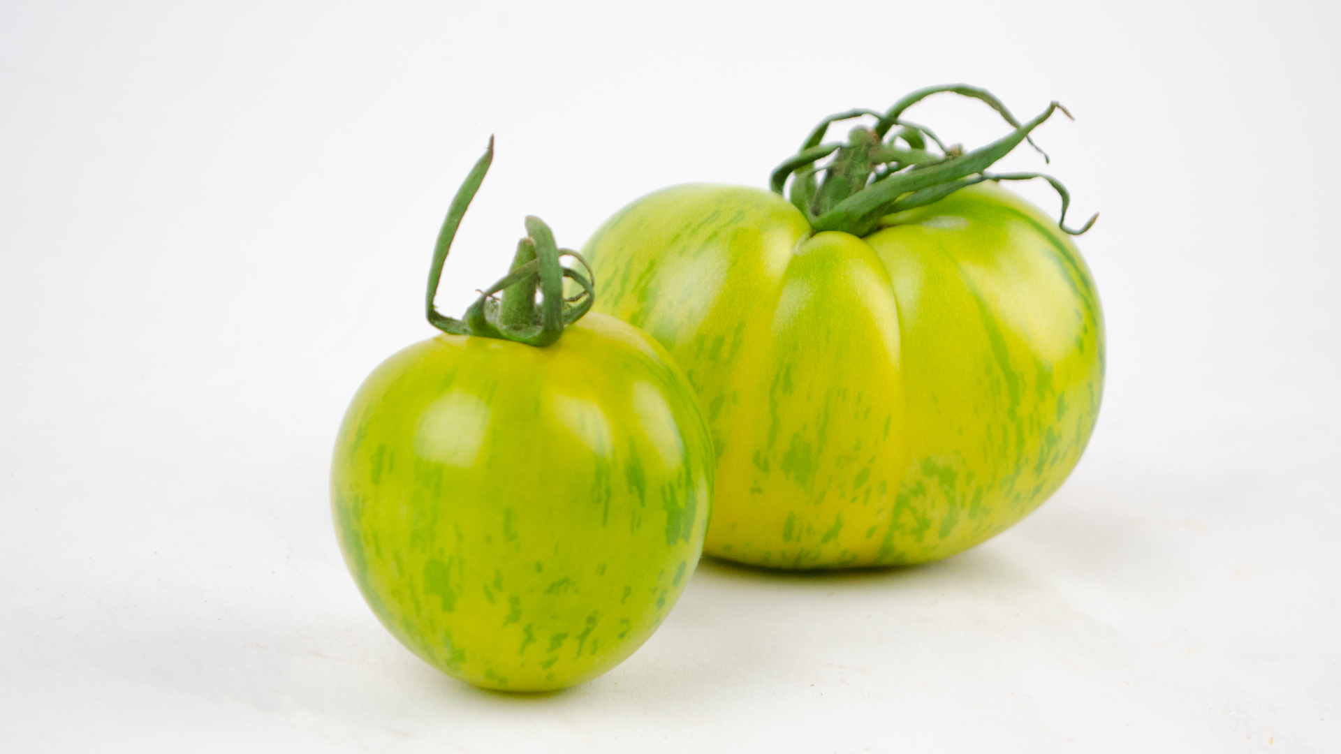 Grüne Fleischtomaten-Kiste